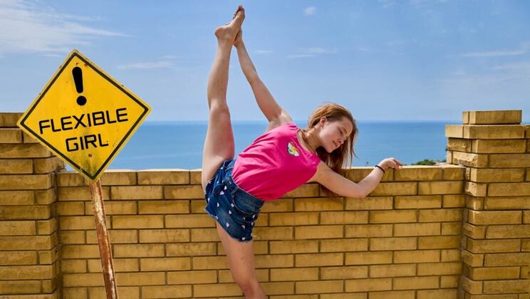 Young and flexible Nicole Murkovski shows off her tight body